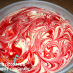White chocolate and rapsberry cheesecake in tin