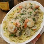 Champagne Prawns And Linguine served in a bowl